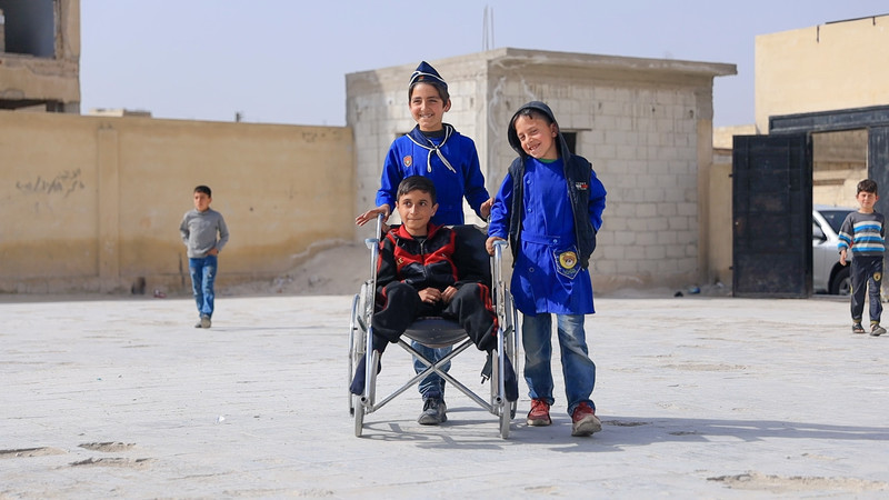 RF1239453_02-Muhammad_is_insisted_to_keep_going_to_school_despite_his_disabilities_-_Morek_-_Rural_Hama.jpg